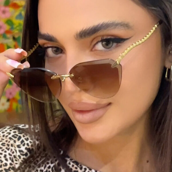 588596527 Snake leg frameless cut cat eye sunglasses, fashionable spicy girl sun protection sunglasses for women